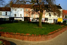 Colourful shops in St Augustines Street, Norwich